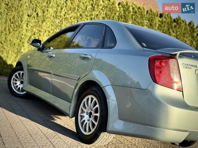 Зелений Шевроле Лачетті, об'ємом двигуна 1.8 л та пробігом 296 тис. км за 4200 $, фото 19 на Automoto.ua