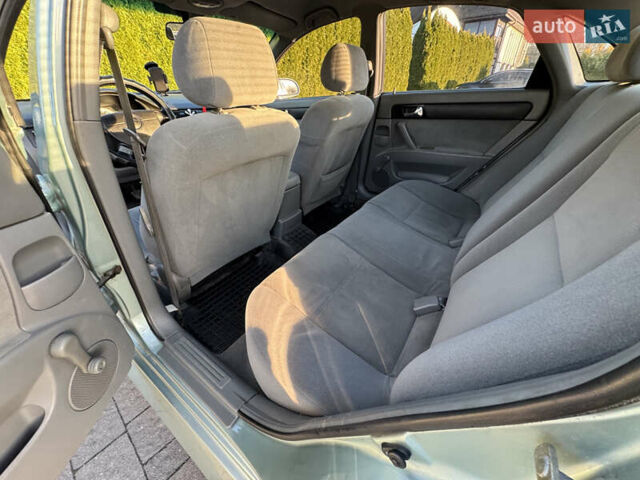 Зелений Шевроле Лачетті, об'ємом двигуна 1.8 л та пробігом 296 тис. км за 4200 $, фото 34 на Automoto.ua