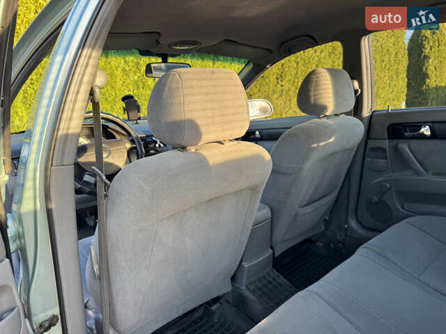 Зелений Шевроле Лачетті, об'ємом двигуна 1.8 л та пробігом 296 тис. км за 4200 $, фото 36 на Automoto.ua