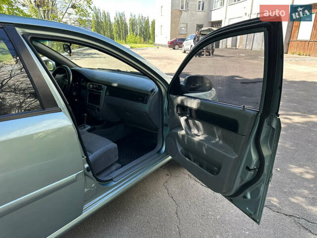 Зеленый Шевроле Лачетти, объемом двигателя 1.8 л и пробегом 355 тыс. км за 2999 $, фото 25 на Automoto.ua