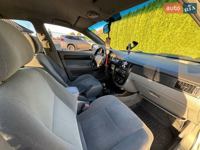 Зелений Шевроле Лачетті, об'ємом двигуна 1.8 л та пробігом 296 тис. км за 4200 $, фото 25 на Automoto.ua