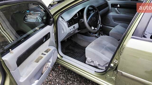 Зелений Шевроле Лачетті, об'ємом двигуна 1.8 л та пробігом 388 тис. км за 5399 $, фото 5 на Automoto.ua