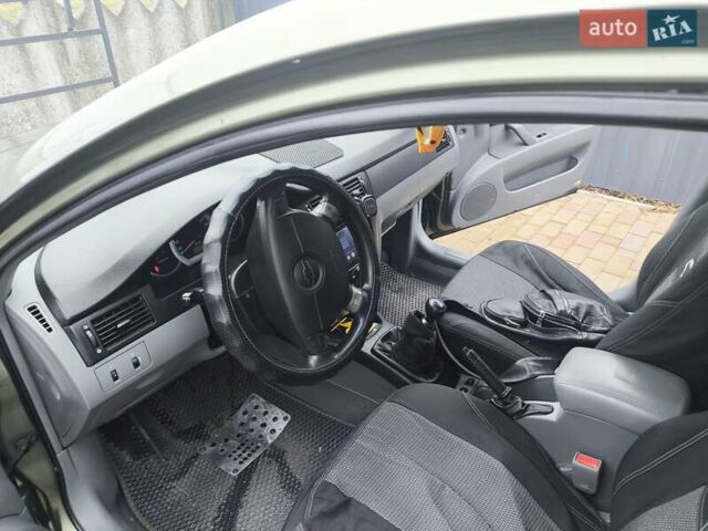 Зеленый Шевроле Лачетти, объемом двигателя 1.6 л и пробегом 259 тыс. км за 4300 $, фото 2 на Automoto.ua