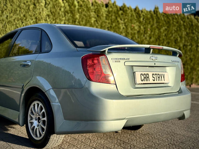 Зелений Шевроле Лачетті, об'ємом двигуна 1.8 л та пробігом 296 тис. км за 4200 $, фото 18 на Automoto.ua