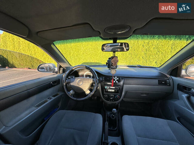 Зелений Шевроле Лачетті, об'ємом двигуна 1.8 л та пробігом 296 тис. км за 4200 $, фото 28 на Automoto.ua