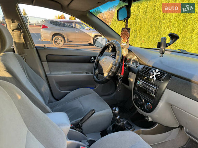 Зелений Шевроле Лачетті, об'ємом двигуна 1.8 л та пробігом 296 тис. км за 4200 $, фото 4 на Automoto.ua