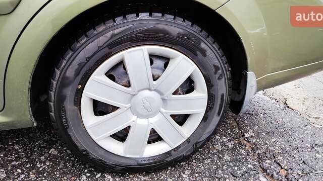 Зелений Шевроле Лачетті, об'ємом двигуна 1.8 л та пробігом 388 тис. км за 5399 $, фото 15 на Automoto.ua