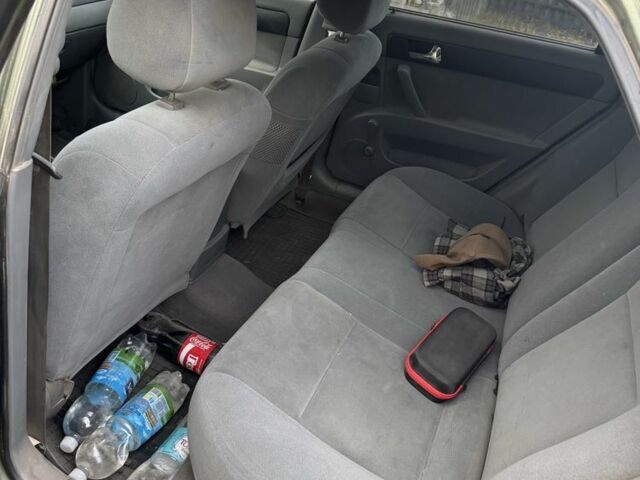 Зелений Шевроле Лачетті, об'ємом двигуна 1.8 л та пробігом 232 тис. км за 2500 $, фото 6 на Automoto.ua