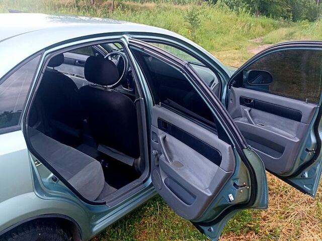 Зеленый Шевроле Лачетти, объемом двигателя 1.6 л и пробегом 265 тыс. км за 3700 $, фото 9 на Automoto.ua