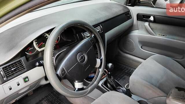 Зелений Шевроле Лачетті, об'ємом двигуна 1.8 л та пробігом 388 тис. км за 5399 $, фото 7 на Automoto.ua