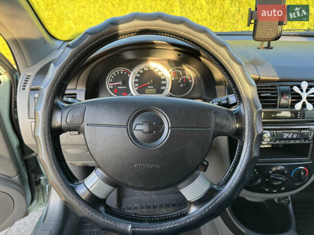 Зелений Шевроле Лачетті, об'ємом двигуна 1.8 л та пробігом 296 тис. км за 4200 $, фото 44 на Automoto.ua
