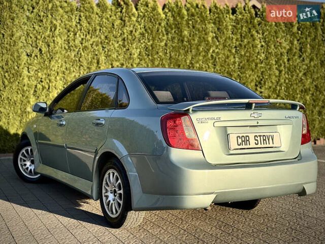 Зелений Шевроле Лачетті, об'ємом двигуна 1.8 л та пробігом 296 тис. км за 4200 $, фото 16 на Automoto.ua