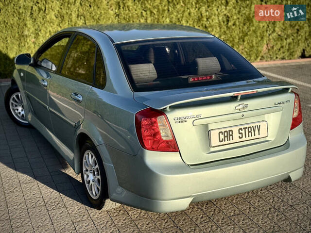 Зелений Шевроле Лачетті, об'ємом двигуна 1.8 л та пробігом 296 тис. км за 4200 $, фото 20 на Automoto.ua