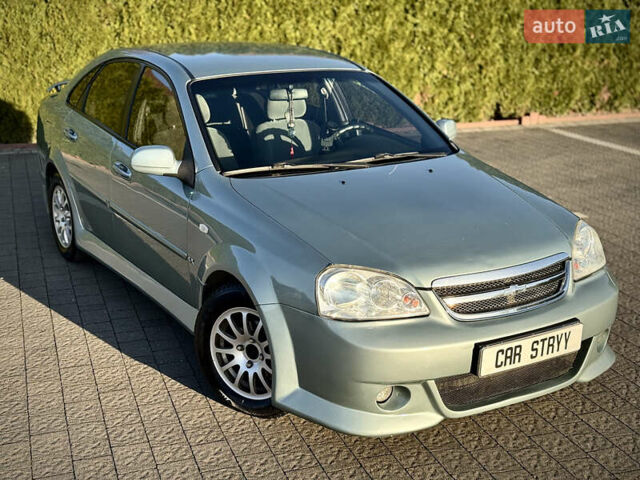Зелений Шевроле Лачетті, об'ємом двигуна 1.8 л та пробігом 296 тис. км за 4200 $, фото 12 на Automoto.ua
