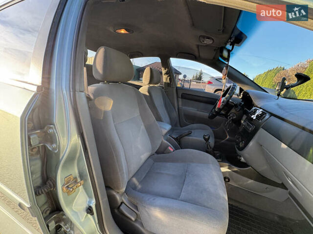 Зелений Шевроле Лачетті, об'ємом двигуна 1.8 л та пробігом 296 тис. км за 4200 $, фото 24 на Automoto.ua