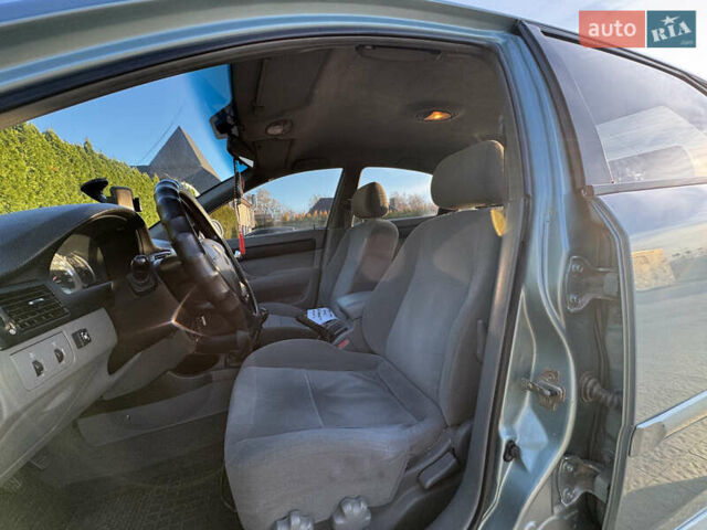 Зелений Шевроле Лачетті, об'ємом двигуна 1.8 л та пробігом 296 тис. км за 4200 $, фото 38 на Automoto.ua