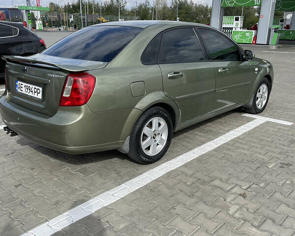 Зелений Шевроле Лачетті, об'ємом двигуна 1.8 л та пробігом 220 тис. км за 4500 $, фото 9 на Automoto.ua