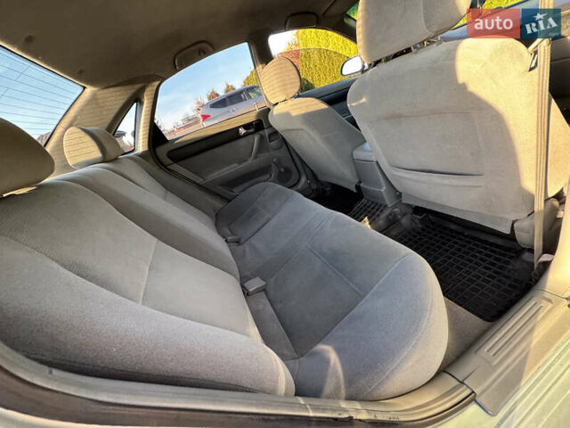 Зелений Шевроле Лачетті, об'ємом двигуна 1.8 л та пробігом 296 тис. км за 4200 $, фото 30 на Automoto.ua
