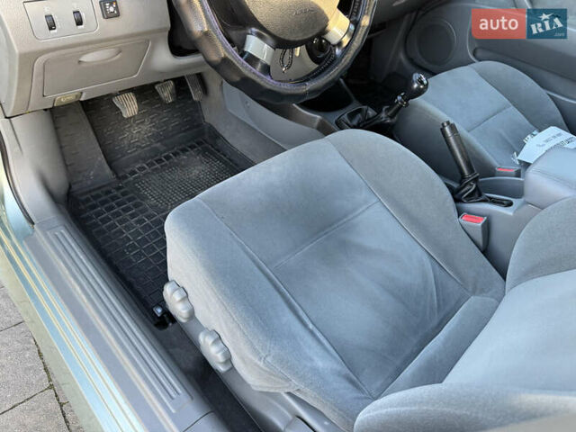 Зелений Шевроле Лачетті, об'ємом двигуна 1.8 л та пробігом 296 тис. км за 4200 $, фото 39 на Automoto.ua