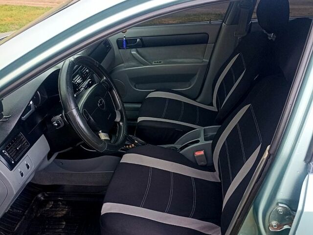 Зеленый Шевроле Лачетти, объемом двигателя 1.6 л и пробегом 265 тыс. км за 3700 $, фото 3 на Automoto.ua