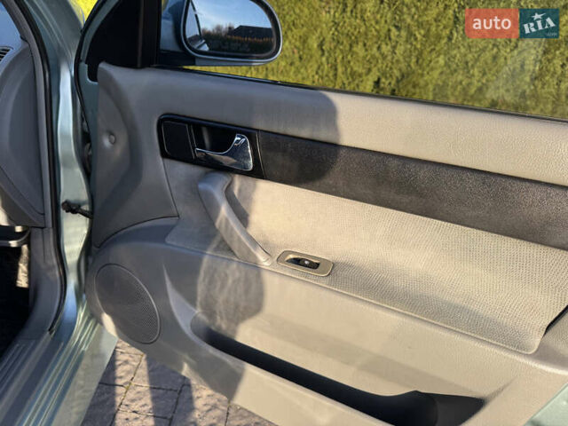 Зелений Шевроле Лачетті, об'ємом двигуна 1.8 л та пробігом 296 тис. км за 4200 $, фото 27 на Automoto.ua