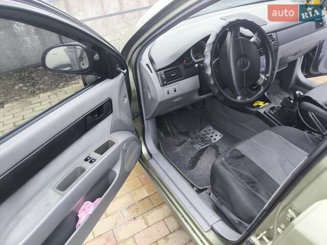 Зеленый Шевроле Лачетти, объемом двигателя 1.6 л и пробегом 259 тыс. км за 4300 $, фото 3 на Automoto.ua