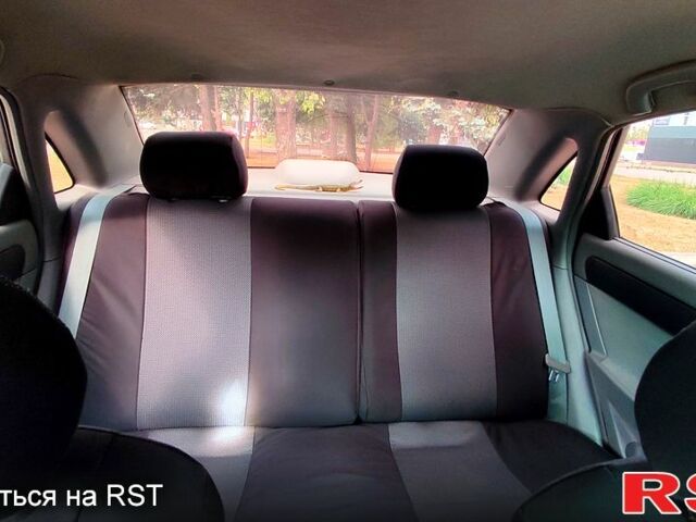 Зелений Шевроле Лачетті, об'ємом двигуна 1.8 л та пробігом 216 тис. км за 4500 $, фото 3 на Automoto.ua