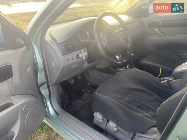 Зеленый Шевроле Лачетти, объемом двигателя 1.6 л и пробегом 230 тыс. км за 3900 $, фото 1 на Automoto.ua