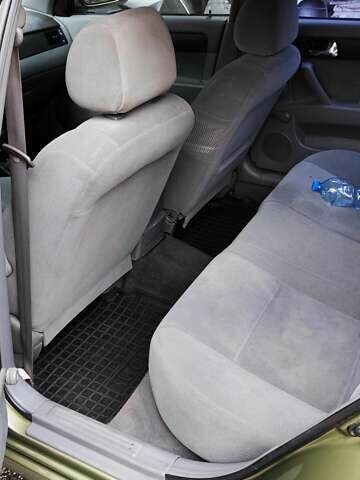 Зелений Шевроле Лачетті, об'ємом двигуна 1.8 л та пробігом 388 тис. км за 5399 $, фото 9 на Automoto.ua