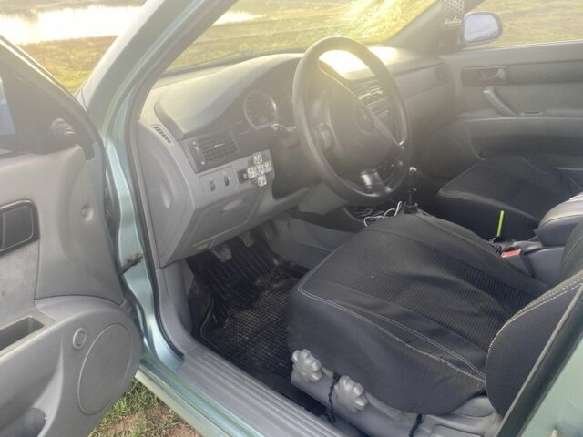 Зеленый Шевроле Лачетти, объемом двигателя 1.6 л и пробегом 230 тыс. км за 4200 $, фото 2 на Automoto.ua