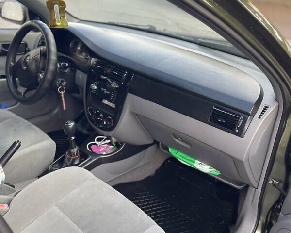 Зеленый Шевроле Лачетти, объемом двигателя 1.8 л и пробегом 300 тыс. км за 3250 $, фото 11 на Automoto.ua