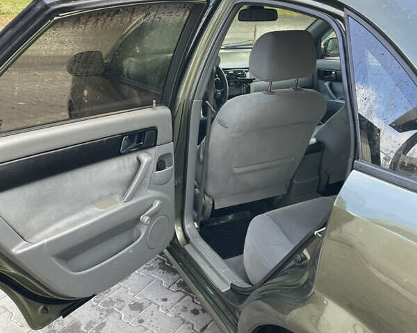 Зеленый Шевроле Лачетти, объемом двигателя 1.8 л и пробегом 300 тыс. км за 3250 $, фото 9 на Automoto.ua