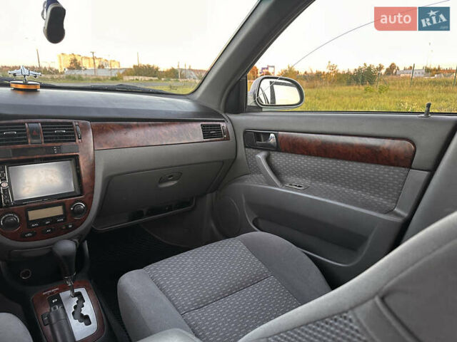 Зеленый Шевроле Лачетти, объемом двигателя 1.8 л и пробегом 232 тыс. км за 3400 $, фото 16 на Automoto.ua
