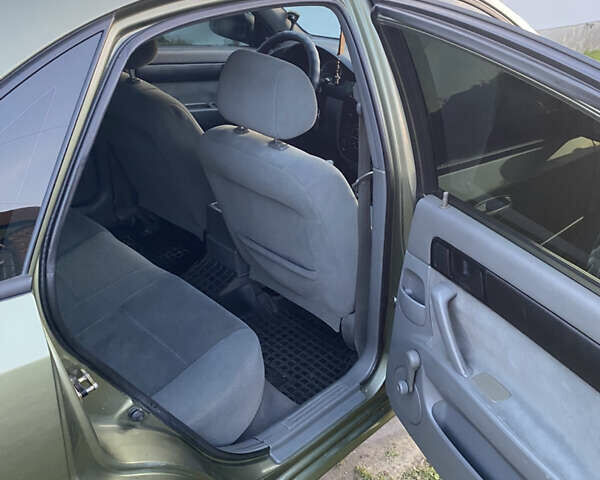 Зеленый Шевроле Лачетти, объемом двигателя 1.6 л и пробегом 350 тыс. км за 3700 $, фото 5 на Automoto.ua