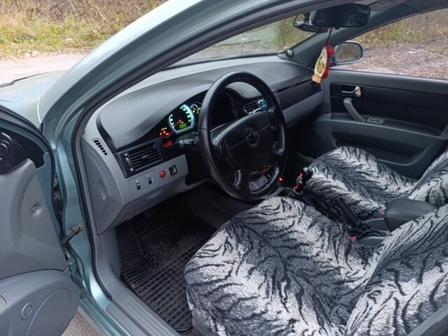 Зеленый Шевроле Лачетти, объемом двигателя 1.8 л и пробегом 208 тыс. км за 3800 $, фото 12 на Automoto.ua