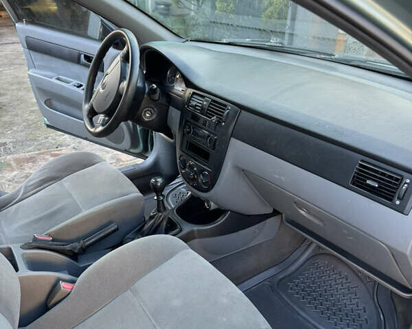 Зеленый Шевроле Лачетти, объемом двигателя 1.6 л и пробегом 287 тыс. км за 3100 $, фото 12 на Automoto.ua