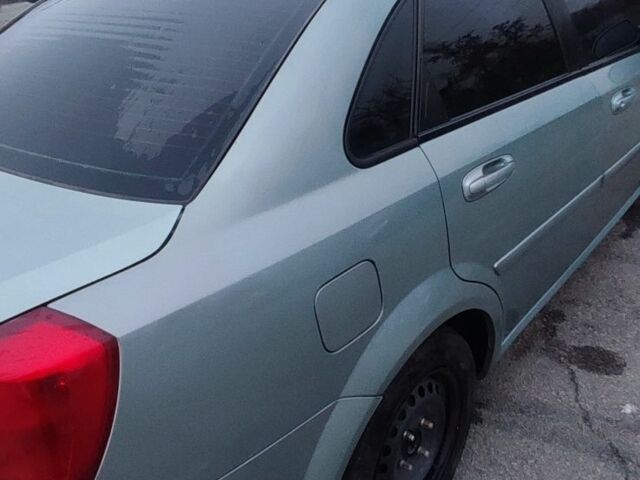 Зеленый Шевроле Лачетти, объемом двигателя 1.6 л и пробегом 223 тыс. км за 3900 $, фото 4 на Automoto.ua