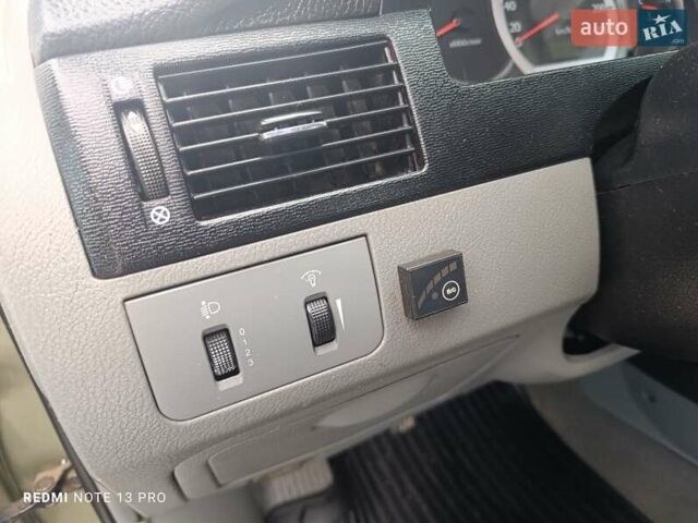 Зелений Шевроле Лачетті, об'ємом двигуна 1.6 л та пробігом 280 тис. км за 3499 $, фото 11 на Automoto.ua