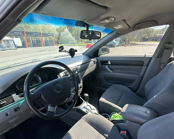 Зелений Шевроле Лачетті, об'ємом двигуна 1.8 л та пробігом 222 тис. км за 4000 $, фото 8 на Automoto.ua