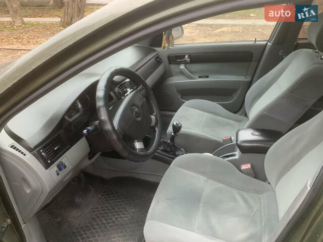 Зеленый Шевроле Лачетти, объемом двигателя 1.8 л и пробегом 300 тыс. км за 3200 $, фото 9 на Automoto.ua