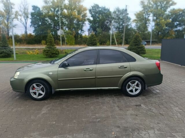 Зеленый Шевроле Лачетти, объемом двигателя 1.6 л и пробегом 253 тыс. км за 3650 $, фото 2 на Automoto.ua