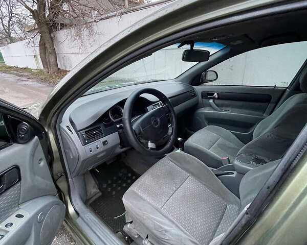 Зеленый Шевроле Лачетти, объемом двигателя 1.8 л и пробегом 275 тыс. км за 2600 $, фото 8 на Automoto.ua