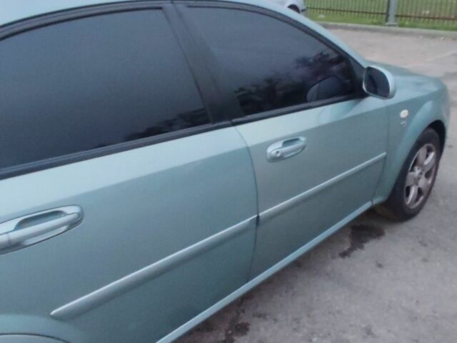 Зеленый Шевроле Лачетти, объемом двигателя 1.6 л и пробегом 223 тыс. км за 3900 $, фото 5 на Automoto.ua