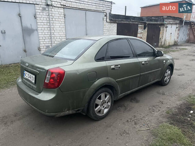 Зелений Шевроле Лачетті, об'ємом двигуна 1.8 л та пробігом 275 тис. км за 2300 $, фото 5 на Automoto.ua