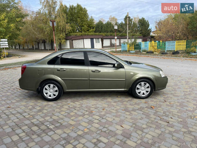 Зелений Шевроле Лачетті, об'ємом двигуна 1.8 л та пробігом 104 тис. км за 5200 $, фото 8 на Automoto.ua
