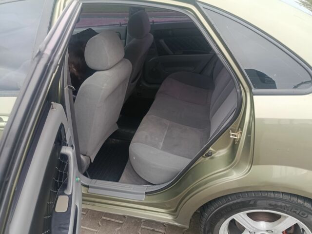 Зеленый Шевроле Лачетти, объемом двигателя 1.6 л и пробегом 253 тыс. км за 3650 $, фото 5 на Automoto.ua