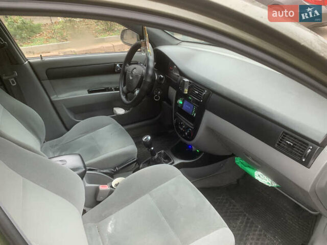 Зеленый Шевроле Лачетти, объемом двигателя 1.8 л и пробегом 300 тыс. км за 3200 $, фото 3 на Automoto.ua