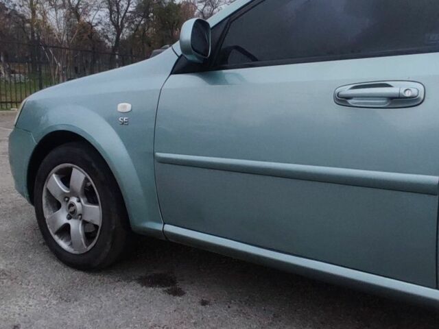 Зеленый Шевроле Лачетти, объемом двигателя 1.6 л и пробегом 223 тыс. км за 3900 $, фото 7 на Automoto.ua