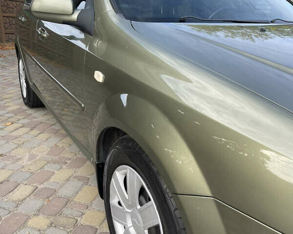 Зелений Шевроле Лачетті, об'ємом двигуна 1.8 л та пробігом 104 тис. км за 5200 $, фото 11 на Automoto.ua