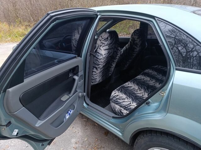 Зеленый Шевроле Лачетти, объемом двигателя 1.8 л и пробегом 208 тыс. км за 3800 $, фото 8 на Automoto.ua